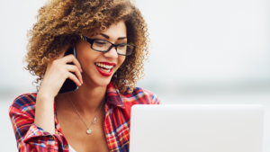 Black woman speaking to someone on a phone